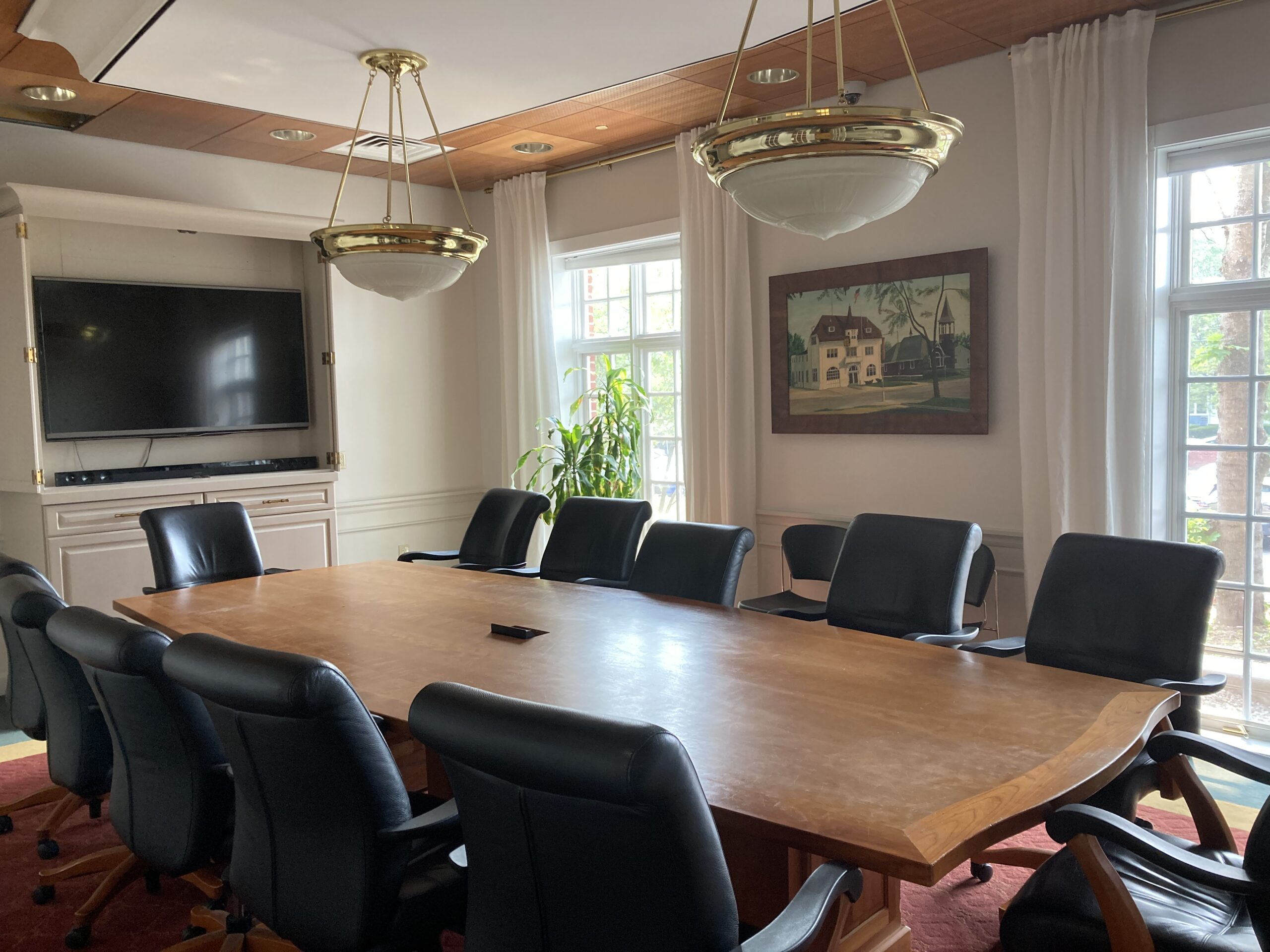 board room with conference table and monitor