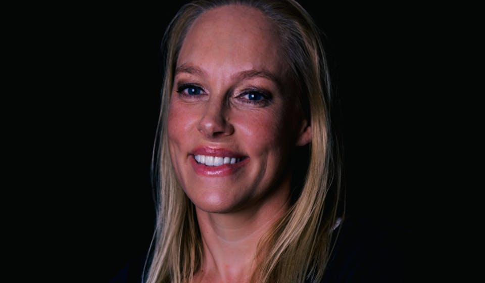 Image of author, Allie Reynolds. Woman, smiling, long blond hair. 