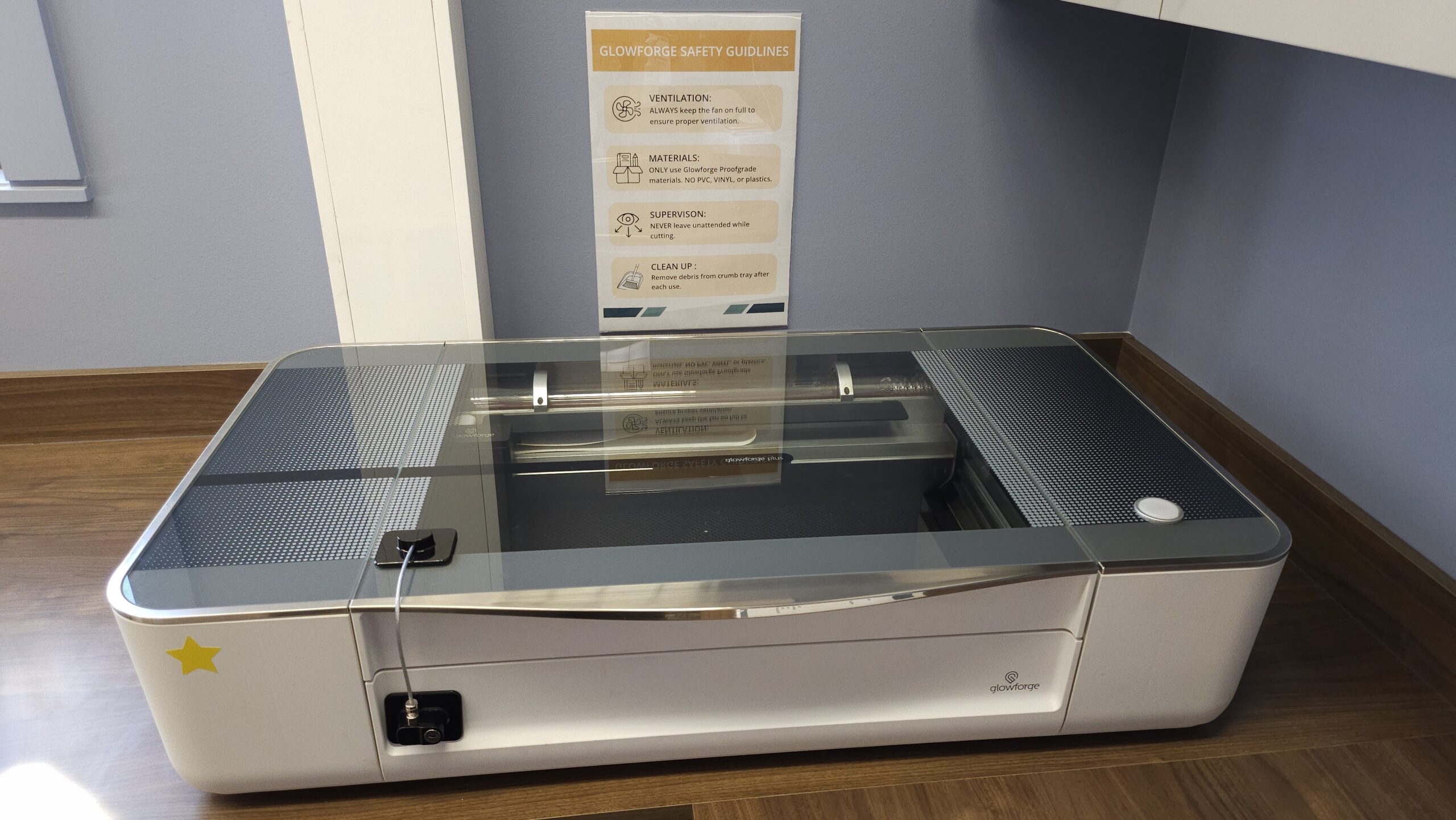 Glowforge machine on a wooden desktop