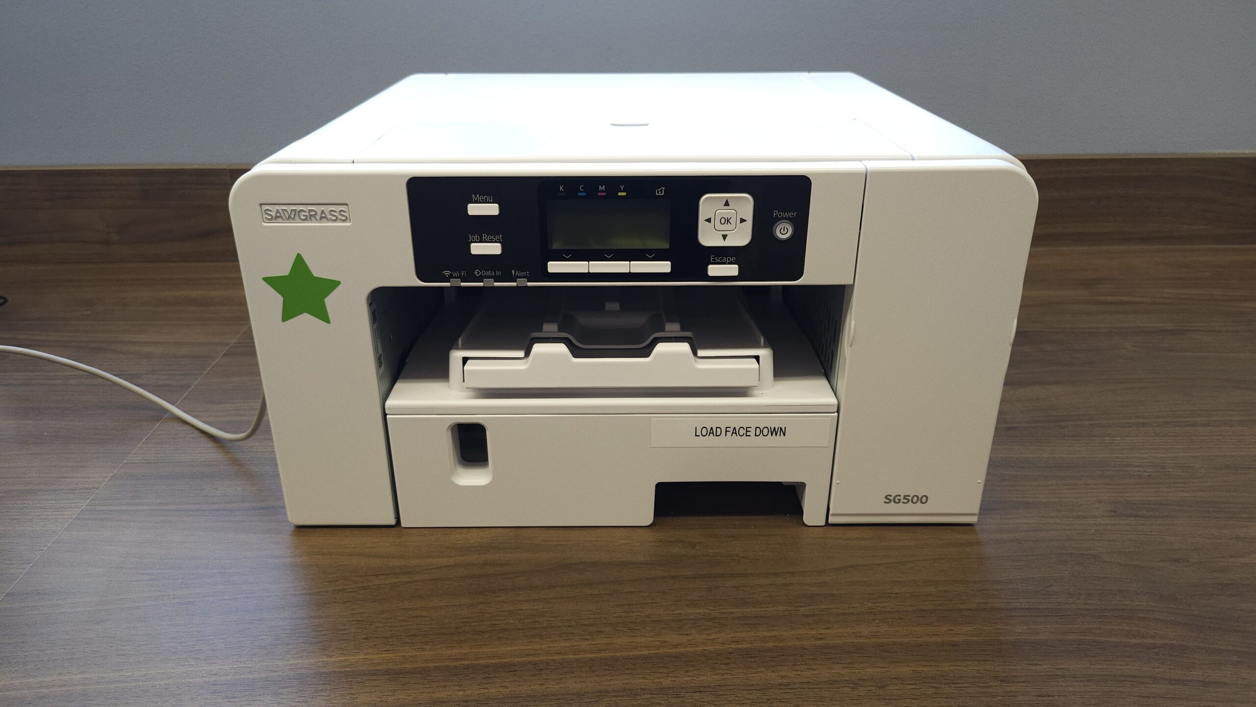 small white printer on a desktop